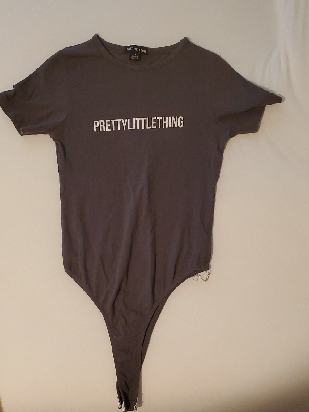 PrettyLittleThing Black Logo Short Sleeve Bodysuit
